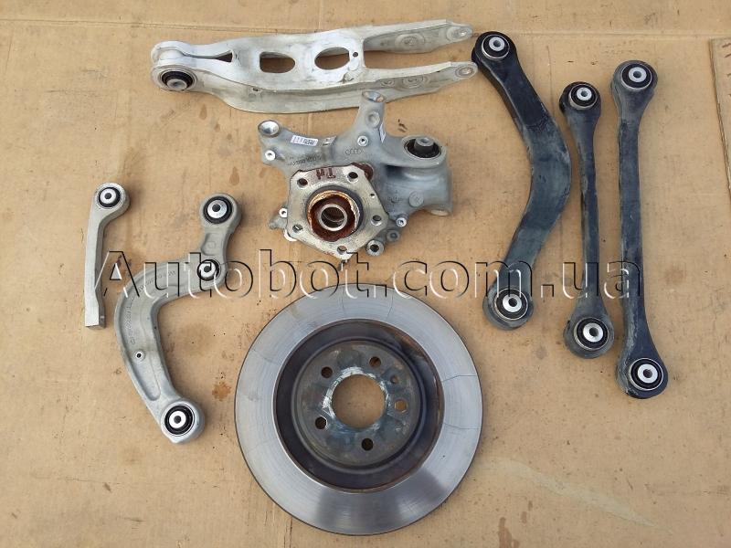 Заказать на AUDI A4 B9 Allroad Quattro (8HW) Цапфа задняя левая с рычагами (в сборе)