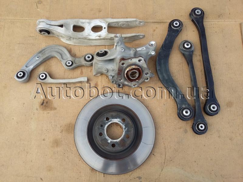 Заказать на AUDI A4 B9 Allroad Quattro (8HW) Цапфа задняя правая с рычагами (в сборе)