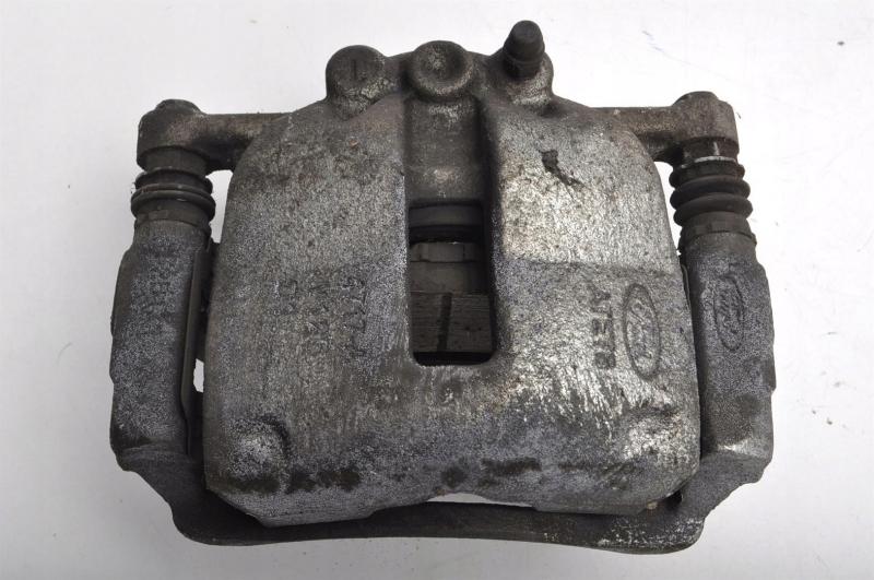 Заказать на FORD Transit Courier Mk I Суппорт тормозной передний левый